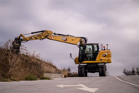 compact wheeled excavator factory|cat wheeled excavators.